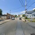 Missing manhole cover in roadway on Grove Street