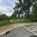 Person sleeping under gazebo at Dutch Park