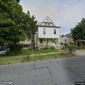 Tree fire close to house on North Clinton Street