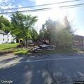 Tree falls on house with people trapped inside