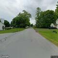 Woman experiencing chest pain near Carmel Road in Highland