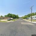 Grass fire threatens trailers and fence in Logan