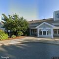Person experiencing abdominal pain at urgent care