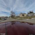 Driver hits parked pickup and calls for officer
