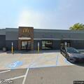 Intoxicated person loitering outside McDonald's