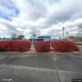 Driver reported driving over curb in parking lot