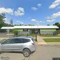 Delivery truck hits drive-through roof at business