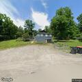 Domestic dispute over backhoe at Pine Hill Road