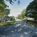 Person starting fire in middle of Wingate Avenue
