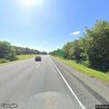 Unoccupied vehicle with hazards on before Exit 10