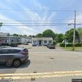 Two-car crash with fluid spill on Route 130