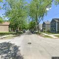 Officers hold red Chevy for investigation at 74th and Kenwood