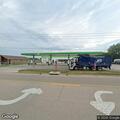 Unoccupied car left at gas station in Hinckley