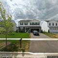 Open garage door and running vehicle reported near N Buckeye St