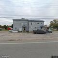 Two people fighting in parking lot, one injured