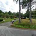 Utility poles down on private driveway in Hurleyville