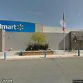 Male leaves Walmart lot on bike with trailer