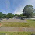 Person experiencing respiratory distress at rehab center