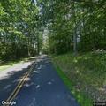 Overturned car on Spring Hill dirt road