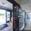 Woman passes out behind wheel at gas station pump