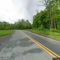 Tree blocking roadway on Rock Lake Drive