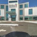 Person experiencing difficulty breathing at Manchester clinic