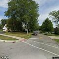 Caller reports cars rolling stop sign near playground