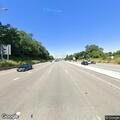 Female in wheelchair falls onto highway roadway
