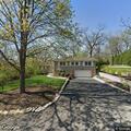 Tree knocks down power line behind Glen Ellyn home