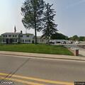 Open door at funeral home after alarm call