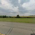 Person with dizziness and leg numbness at factory loading dock