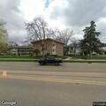 Person experiencing abdominal pain near Batavia