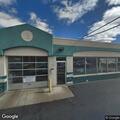 Person possibly unconscious in parked gold SUV