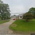 Person damaging house on Center Road