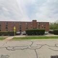 Person experiencing abdominal pain in West Chicago