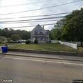Report of detached garage fire near house