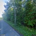 Car in ditch with pole on fire near Montrose campground