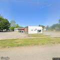 Male found slumped at car wash, breathing unknown