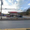 Male semi-conscious at gas station possibly drug related