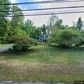 Tree on power lines closes Rhode Island Road