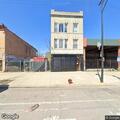 Man showing medical distress at bus stop in Chicago