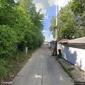 Repeat person sleeping on sidewalk in Bellwood