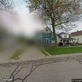 Welfare check at home with door cracked open