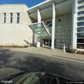Woman with leg pain at Elmhurst library