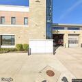 Man with breathing problems at Elburn dealership parking lot