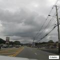 Suspicious man with cart at shopping plaza