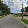 Downed power line sparks shed fire behind house