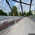 Man playing loud music on 606 trail overpass
