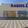 Young child with possible leg fracture at entertainment parking lot