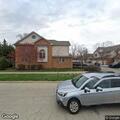 Person with abdominal pain near George Street in Bensenville